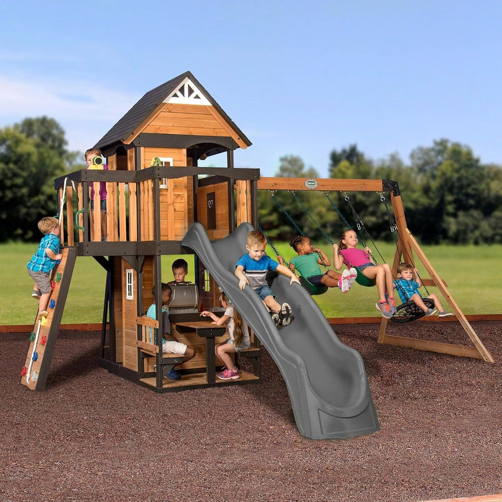 Backyard Discovery Canyon Creek Cedar Wood Swing Set with Wave Slide, Clubhouse, Play Kitchen, Picnic Area, Belt Swings, Web Swing, Rock Wall, Balconies, Playhouse, Step Ladder, Outdoor Playset