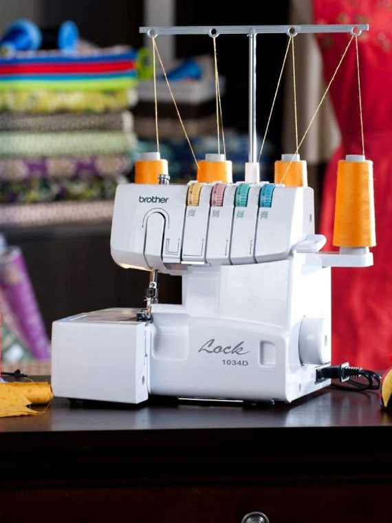 1034D Serger Heavy-Duty Metal Frame Overlock Machine 1300 Stitches Per Minute Removeable Trim Trap 3 Included Accessory Feet