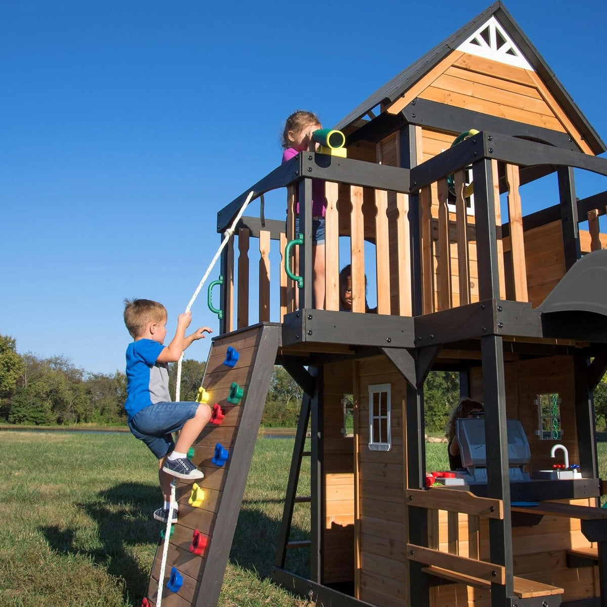 Backyard Discovery Canyon Creek Cedar Wood Swing Set with Wave Slide, Clubhouse, Play Kitchen, Picnic Area, Belt Swings, Web Swing, Rock Wall, Balconies, Playhouse, Step Ladder, Outdoor Playset