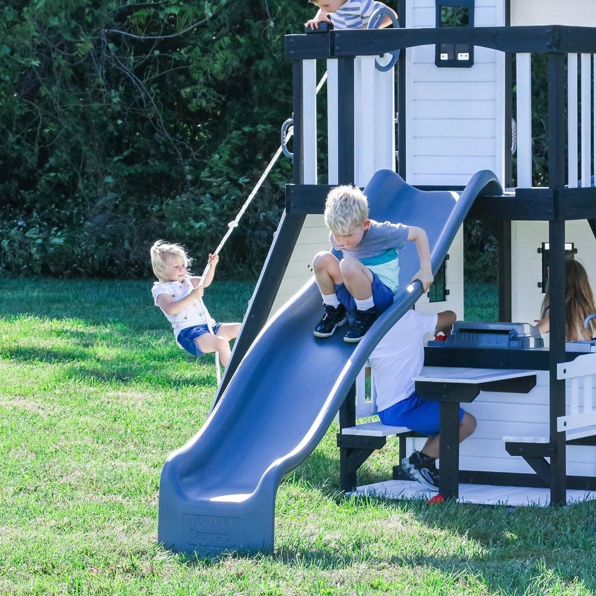 Backyard Discovery Canyon Creek Cedar Wood Swing Set with Wave Slide, Clubhouse, Play Kitchen, Picnic Area, Belt Swings, Web Swing, Rock Wall, Balconies, Playhouse, Step Ladder, Outdoor Playset